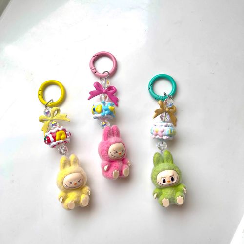Limited Sale: Mini Cartoon Labubu Flocked Trinkets - Can Serve As Keychains, Phone Pendants and Bag Charms, Available in Purple, Green, Pink, Yellow and Blue, Random Delivery