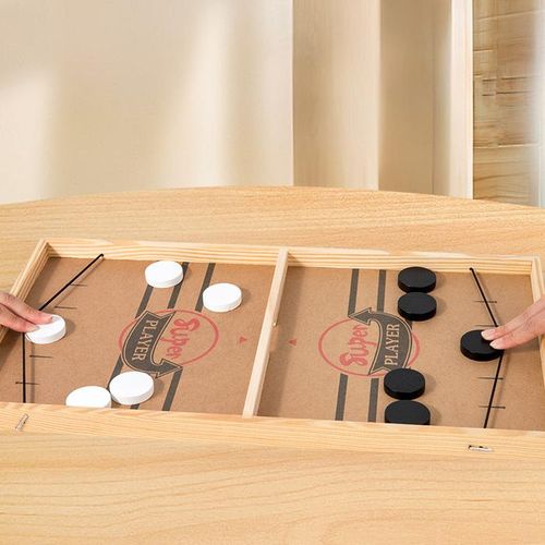 Two-player catapult chess interactive board game for parents and children.