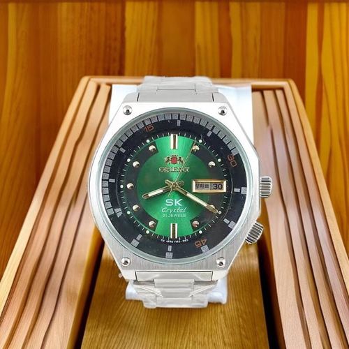 Double Lion Air King Large Dial Mechanical Watch, a fully automatic mechanical timepiece designed for men, featuring luminous hands and indices, as well as waterproof functionality. This watch is powered by an Oriental automatic movement.