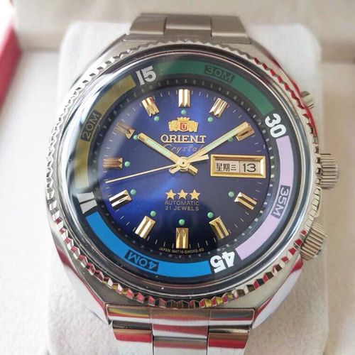 A men's Japanese Double Lion watch, featuring an automatic mechanical movement with a large rotating dial, and a multi-functional luminous wristwatch design.