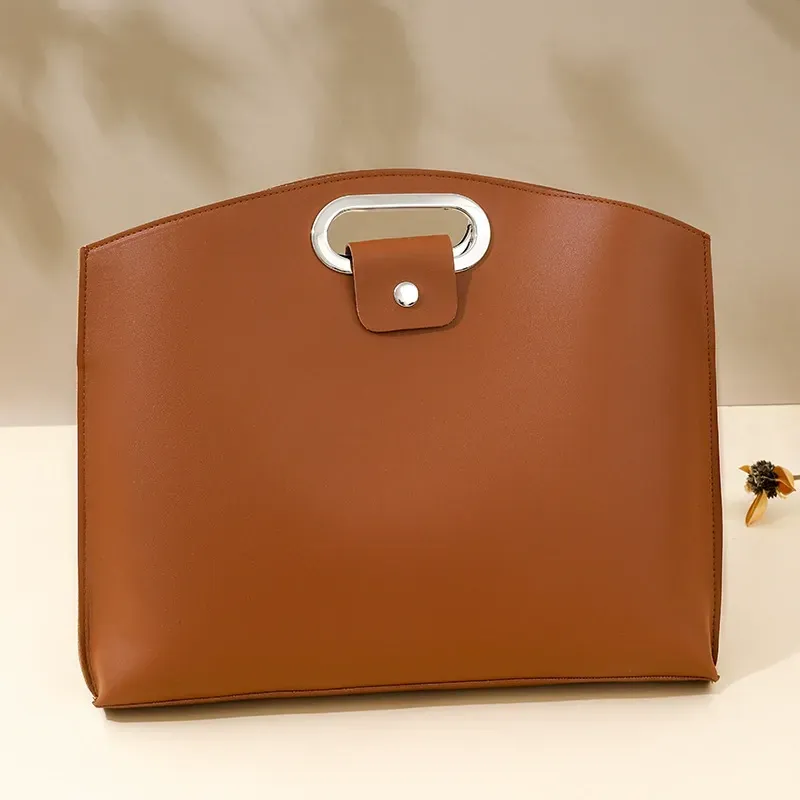 Simple and sophisticated business-style laptop bag for women, new 2025 style, trendy and fashionable, large capacity clutch bag for work and commuting.