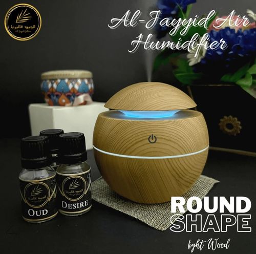 Humidificateur et diffuseur d'air en forme de vase en bois clair