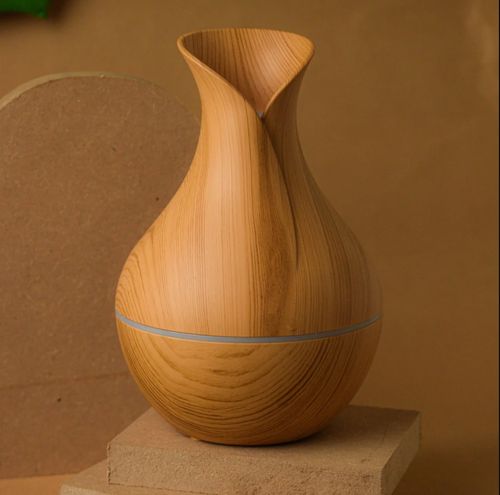 Humidificateur et diffuseur d'air en forme de vase en bois clair