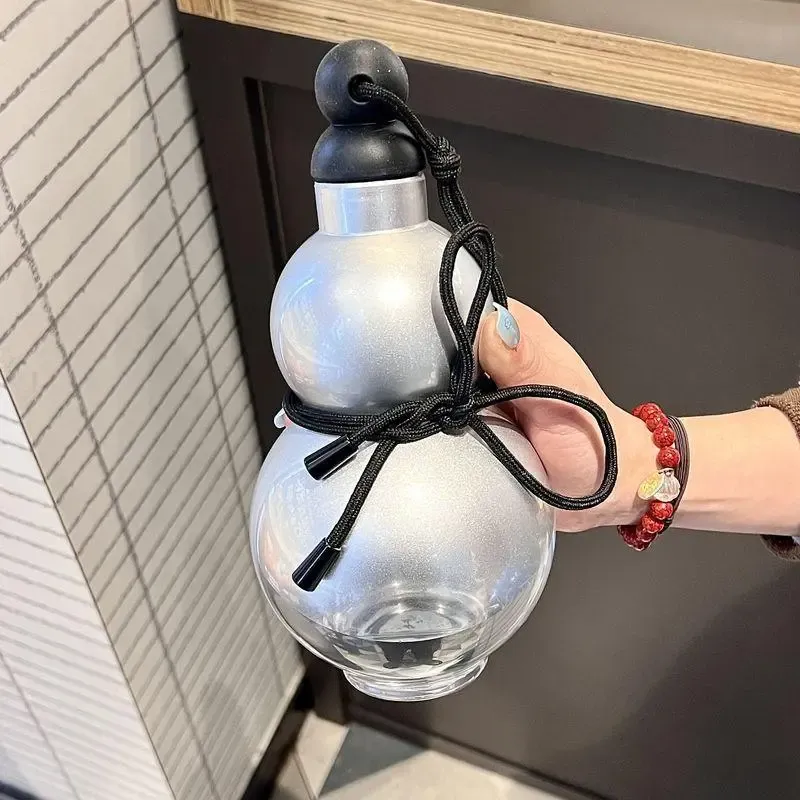 Gourde en forme de gourde, 1 unité. Gourde étanche au design original avec couvercle et anneau de tirage. Gobelet portable de grande capacité pour l'école, le bureau, le camping et les activités de plein air. Gourde transparente.