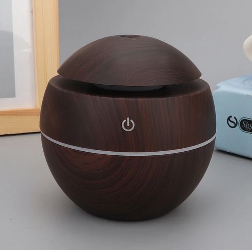 Humidificateur et diffuseur d'air en forme de vase en bois clair