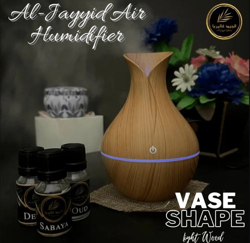 Humidificateur et diffuseur d'air en forme de vase en bois clair