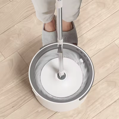 Self-cleaning mop with a dirty water separation system