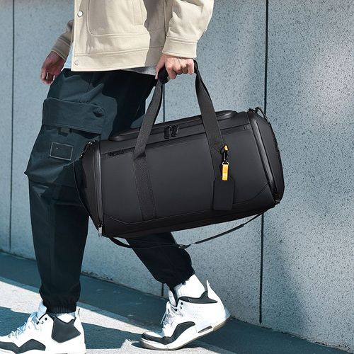 Large-capacity carry-on luggage bag with shoe compartment, dry and wet separation, lightweight and pressure-relieving, hand-held travel bag with retractable handle.