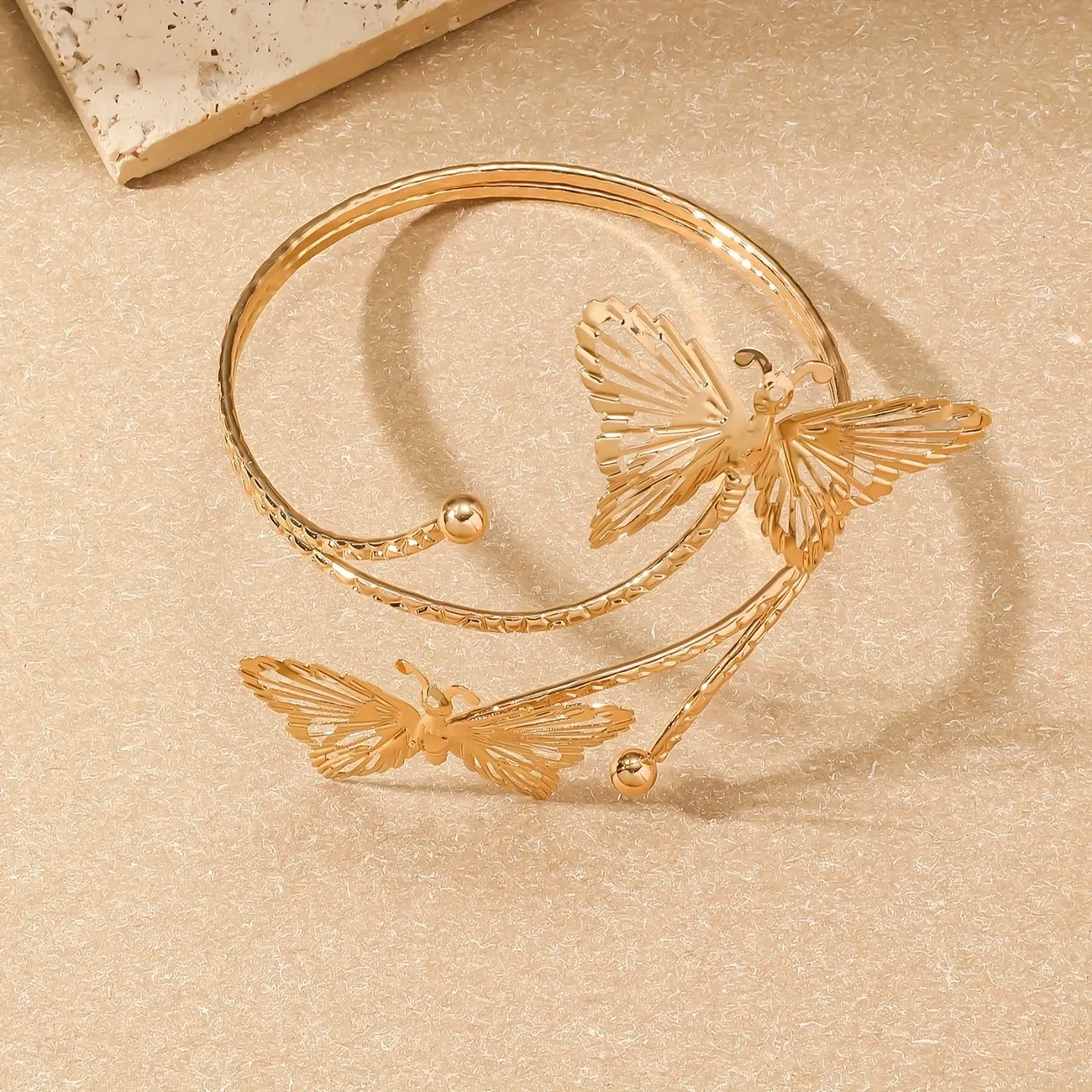 A simple geometric butterfly women's fashion armband