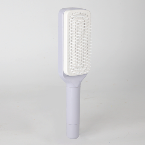 A hairbrush that is easy to clean and retractable