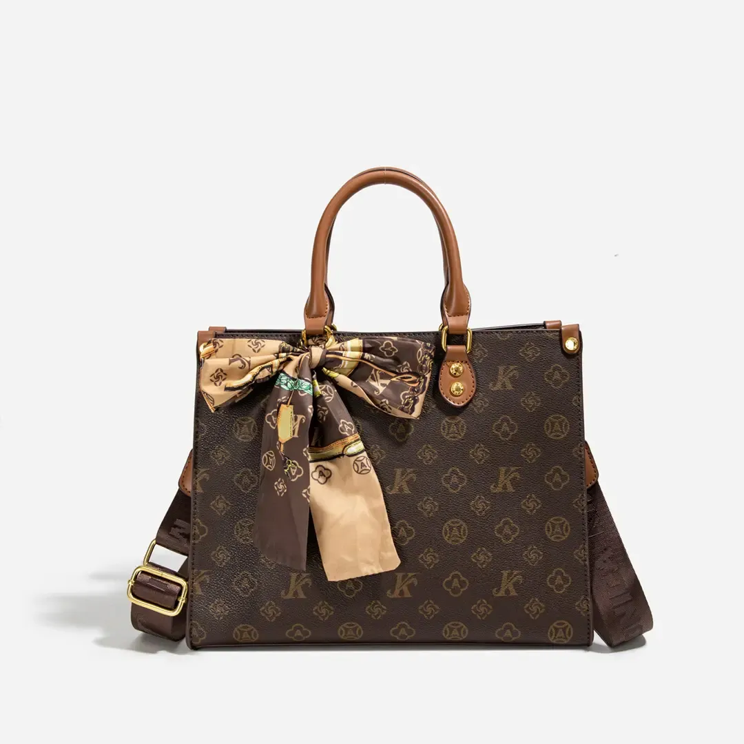 Monica Qiqi Light Luxury European Station Large Capacity Hand-Held Tote Bag Female 2026 New One-Shoulder Commuter Practical