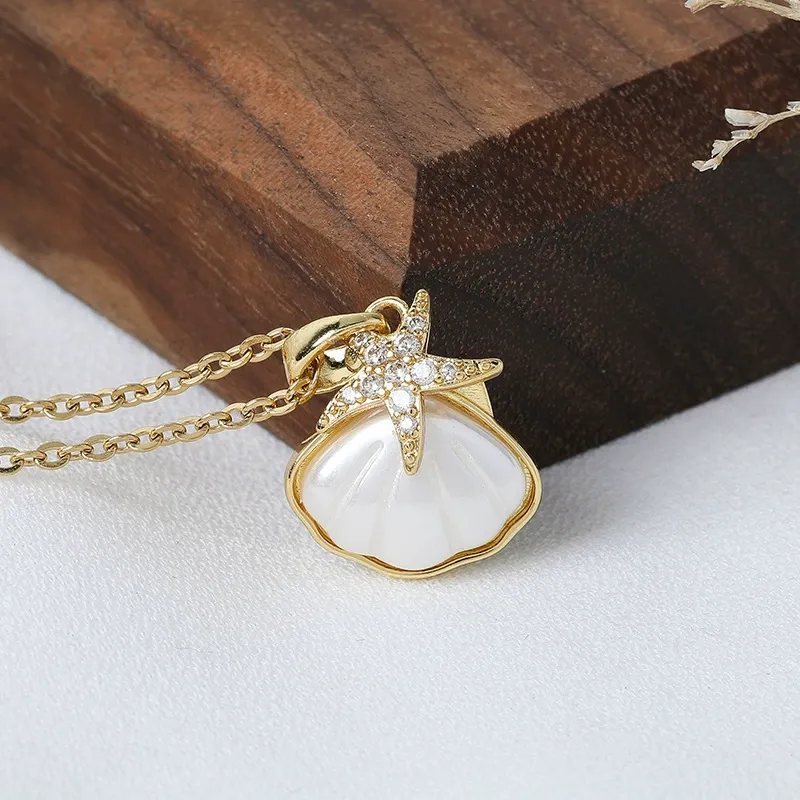 Minimalist Korean Style Titanium Steel Starfish & Shell Necklace for Women - 18K Gold Plated, Unique Ins-Inspired Dainty Jewelry, Fresh & Elegant Collarbone Chain for Daily Wear & Gifting