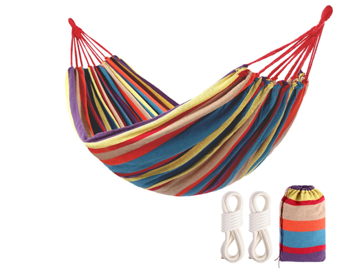 Camping hammock suitable for backyard hanging, sturdy garden, comfortable fabric, indoor tree straps, up to 600 lb load capacity, comes with travel bag, portable outdoor patio suitable for camping.