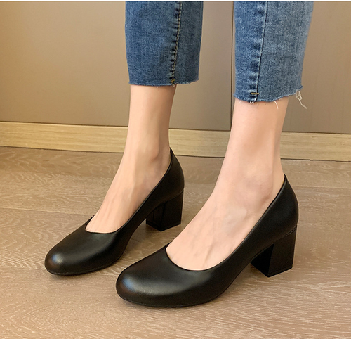 Black leather shoes with thick heels