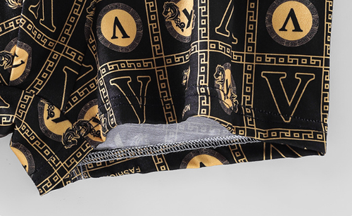 Men's underwear for hair distribution: black and gold briefs