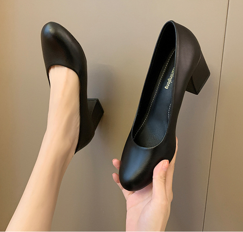 Black leather shoes with thick heels