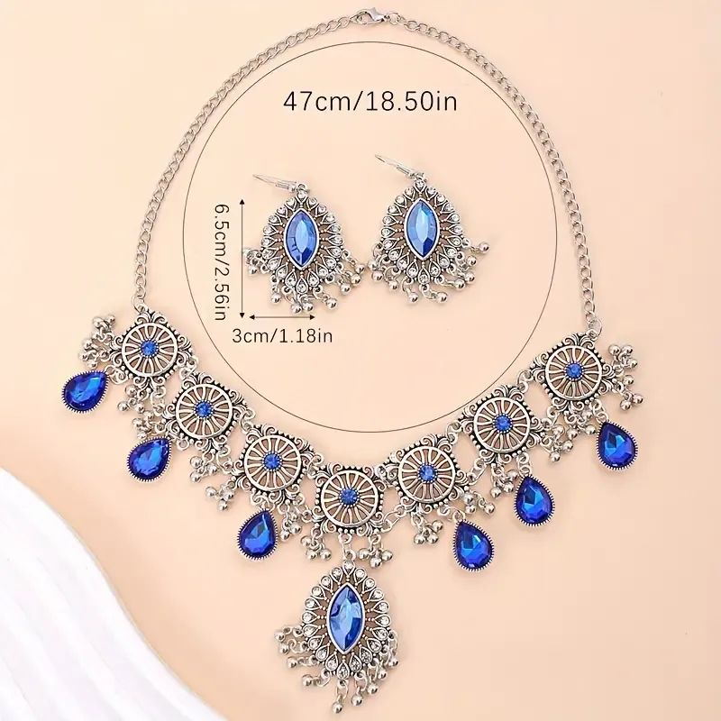 Gem-encrusted drop earrings and necklaces