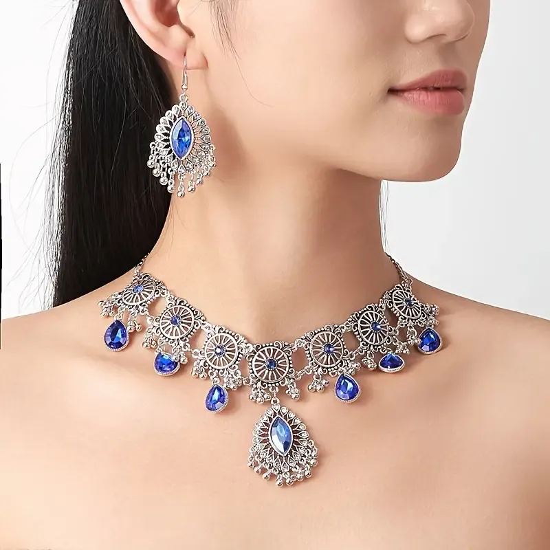 Gem-encrusted drop earrings and necklaces