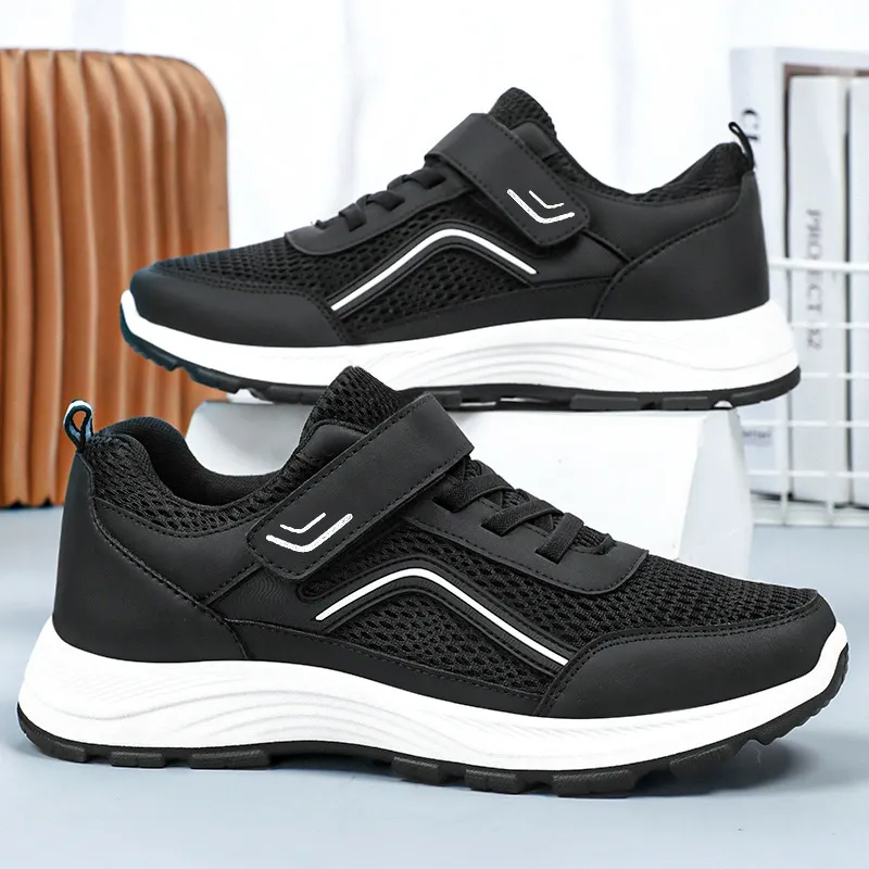 Soft-soled sports shoes with Velcro fastening and breathable mesh upper
