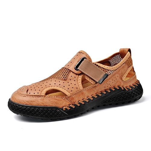 A man wearing anti-slip and wear-resistant wading sandals on the outside