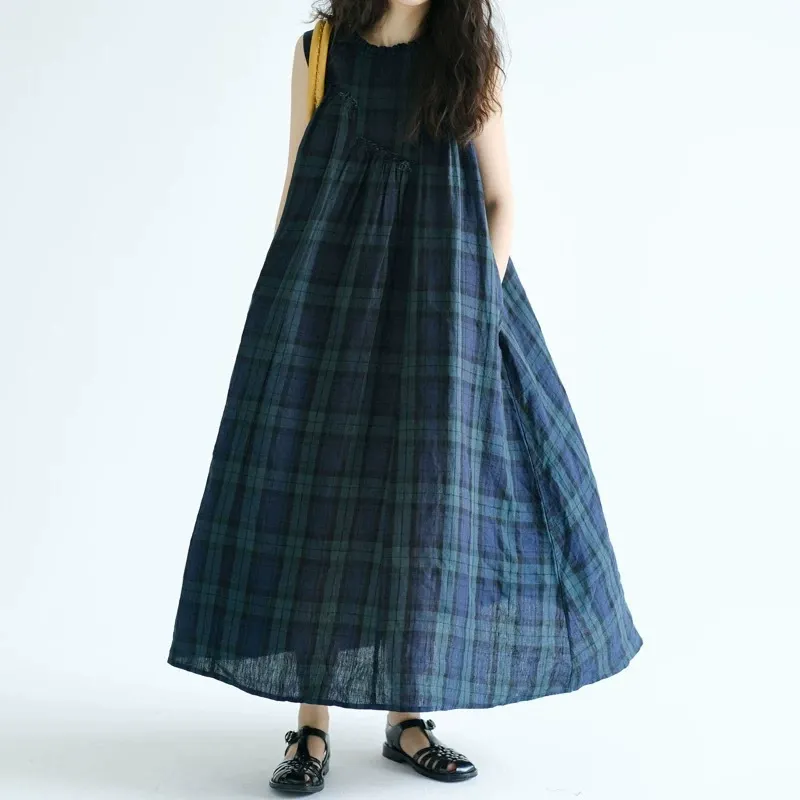 Cotton and linen oversized checkered blouse dress with wooden earflap patch on the front, sleeveless dress