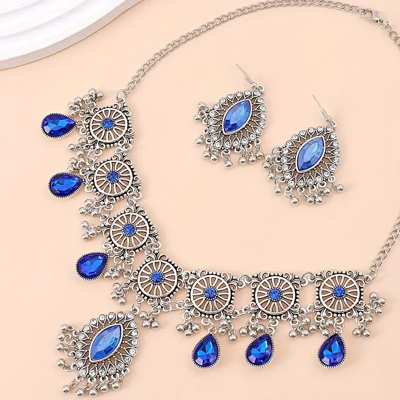 Gem-encrusted drop earrings and necklaces