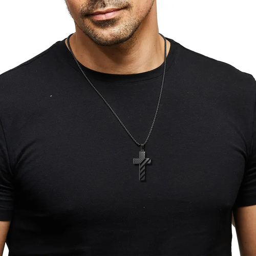 A cross necklace—a symbol of luck and happiness.