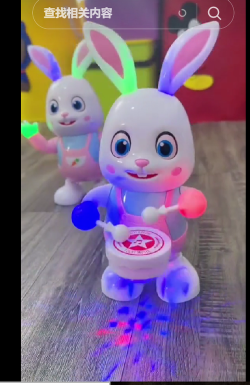 Children's electric dancing drum bunny toy can sing light music shake