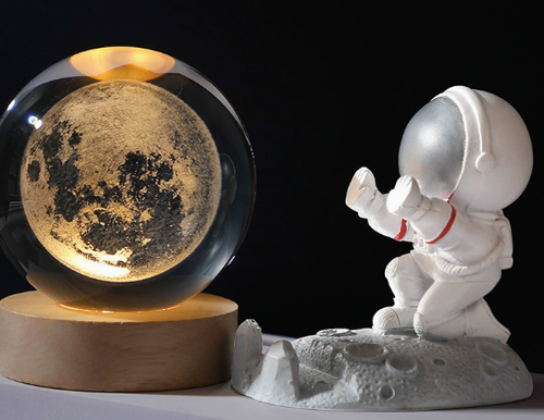 Crystal ball with engraved light