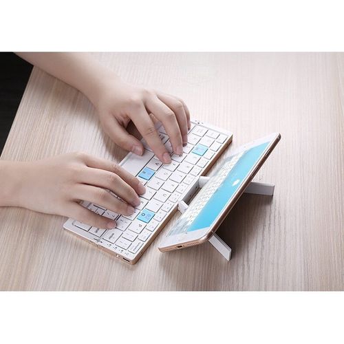 Mini folding 60-key scissor-switch keyboard, portable, rechargeable, silent aluminum alloy casing.