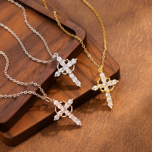 Three-piece set of titanium steel cross necklaces in a gift box, featuring design and colorful cubic zirconia stones.