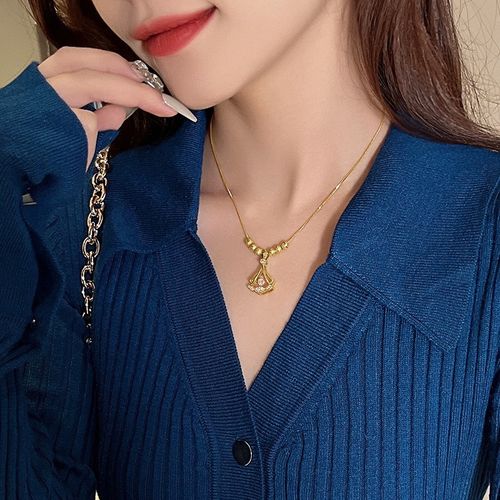 Whispers of Gold: Dainty Ginkgo Leaf Pendant