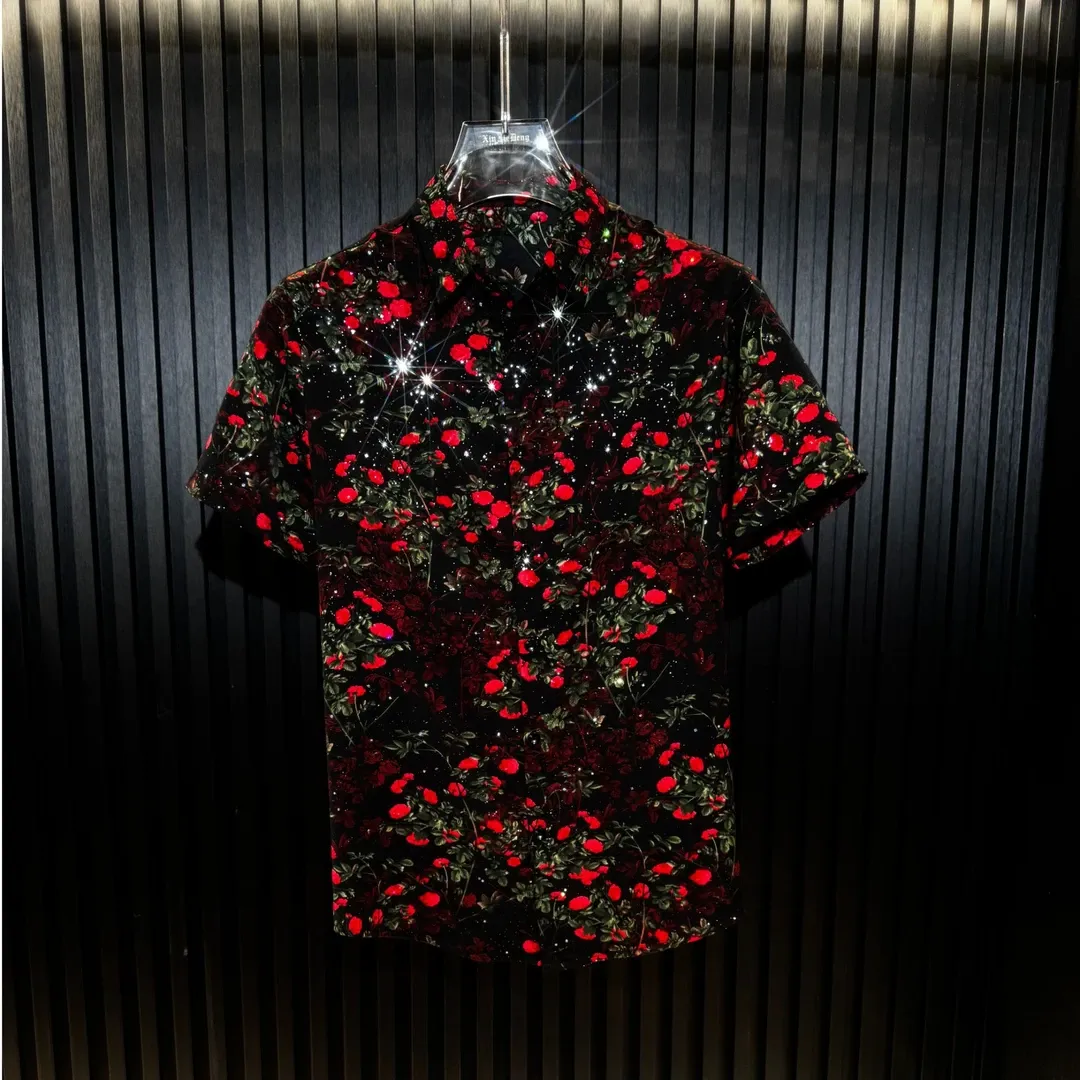 Men's short-sleeve shirt featuring a red flower standing tall on a cliff's edge.