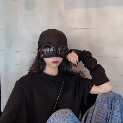 Aviator-style baseball cap with built-in sunglasses