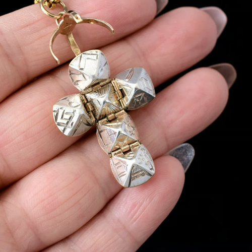 Two-way wearable transforming sphere and cross pendant