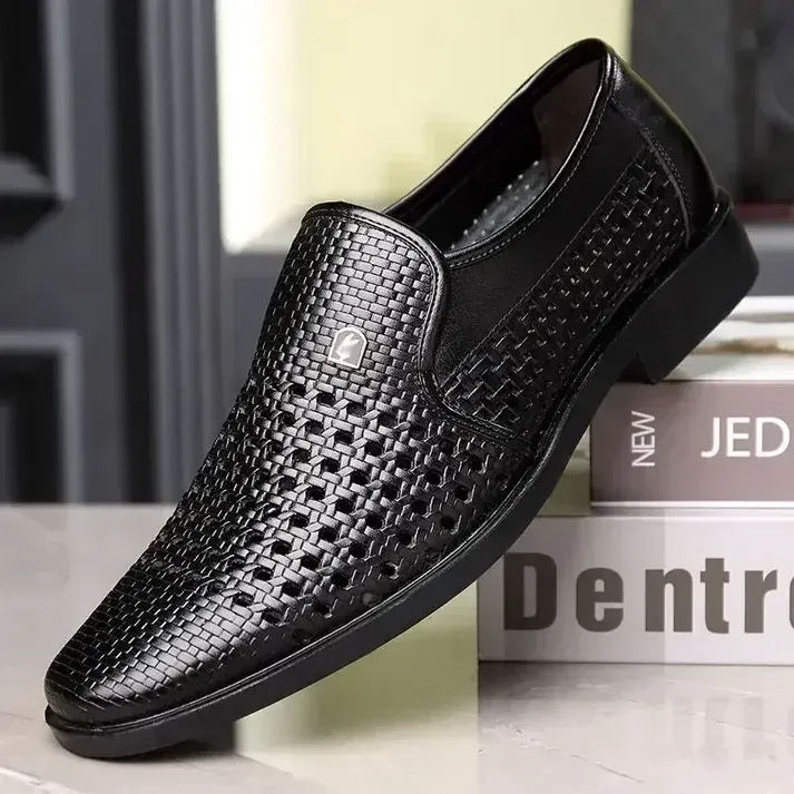 Black breathable perforated leather shoes