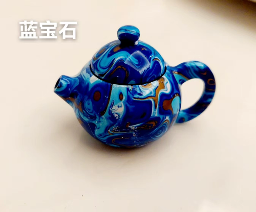 Creative rotating teapot lighter
