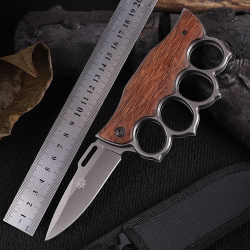 Self-defense four-finger knife