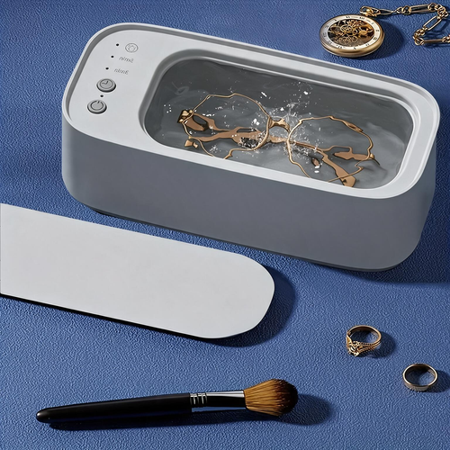 Portable Ultrasonic Cleaner—a compact device for cleaning eyeglasses, using high-frequency vibration to clean jewelry, glasses, dental aligners, and more.