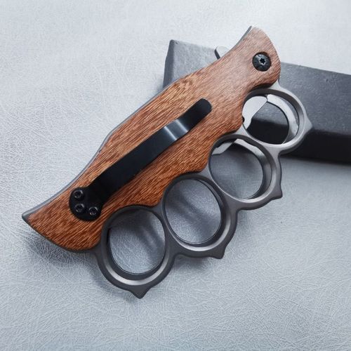 Self-defense four-finger knife