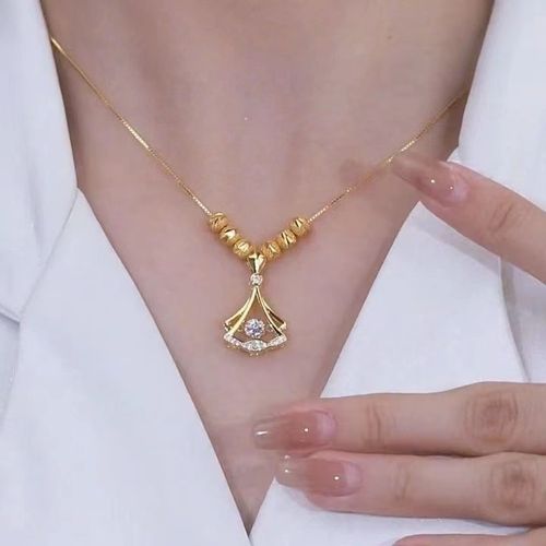 Whispers of Gold: Dainty Ginkgo Leaf Pendant