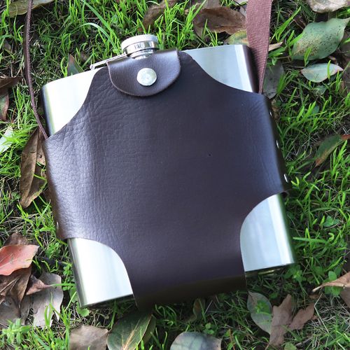 Stainless steel hip flask with leather sheath