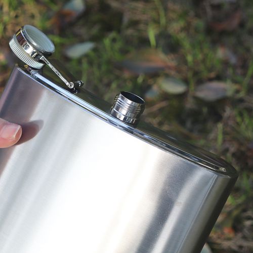 Stainless steel hip flask with leather sheath