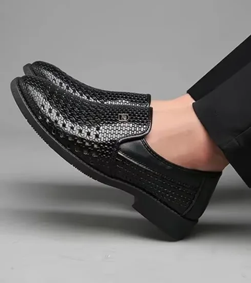 Black breathable perforated leather shoes