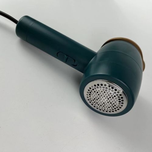 Mini 2-in-1 Electric Iron & Lint Remover: Two Functions in One Device