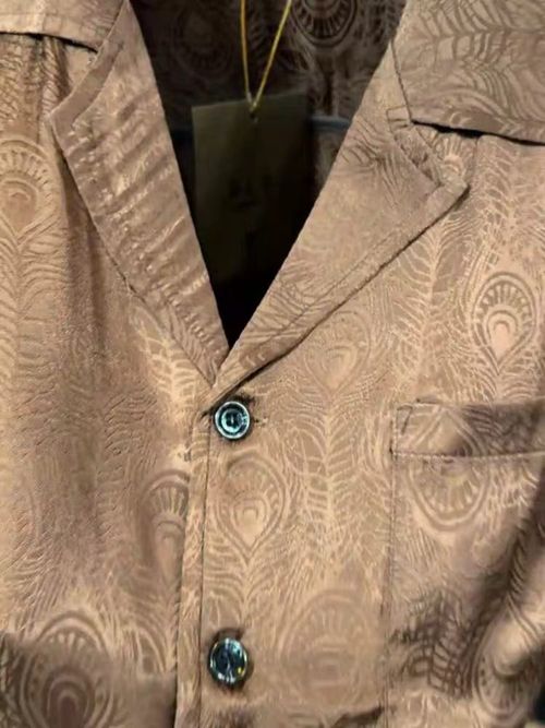 Short-sleeved shirt with brown feather print