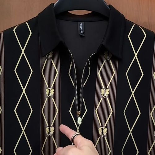 Short-sleeved top with black and gold striped diamond pattern