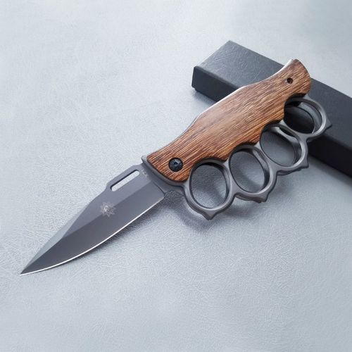 Self-defense four-finger knife