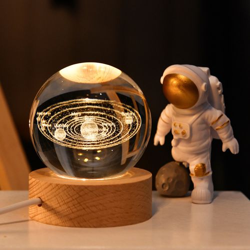 Crystal ball with engraved light