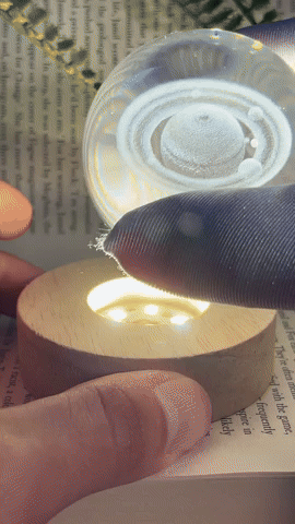 Crystal ball with engraved light